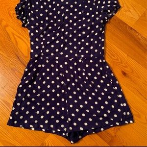 Navy blue polka dot romper
